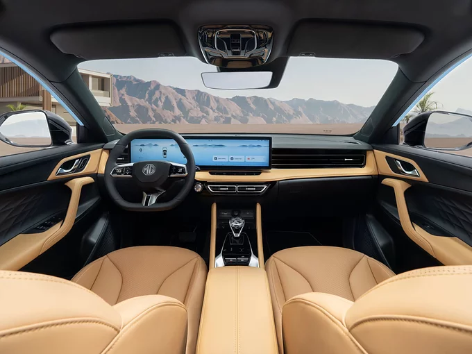 Driver-focused interior of the MG HS Hybrid+ with a 27-inch dual digital display and premium finishes.