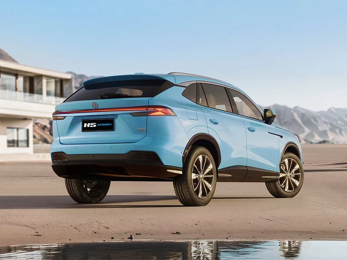 Rear view of the all-new MG HS Hybrid+ featuring a distinctive LED taillight bar and sporty spoiler.