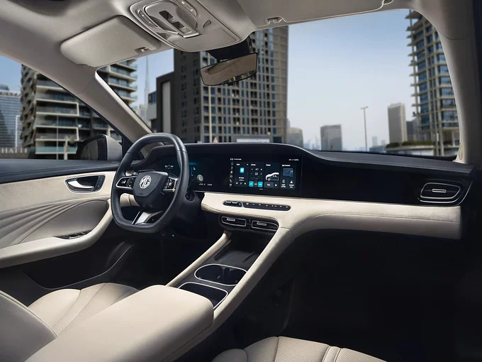 Luxury executive interior of the MG 8 PHEV featuring dual 12.3-inch digital displays and leather seating.